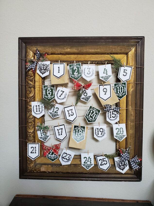s 20 of the best advent calendars to use this december, DIY this stunning Advent calendar using a vintage picture frame