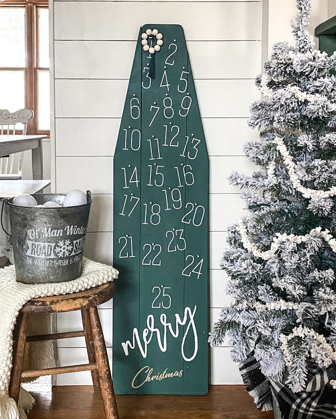 s 20 of the best advent calendars to use this december, Countdown to Christmas with a repurposed old wood ironing board