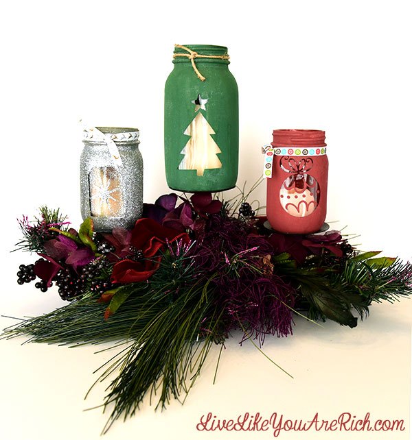 15 fun ways to use empty jars this season, Craft these fun Christmas jars using vinyl cutouts