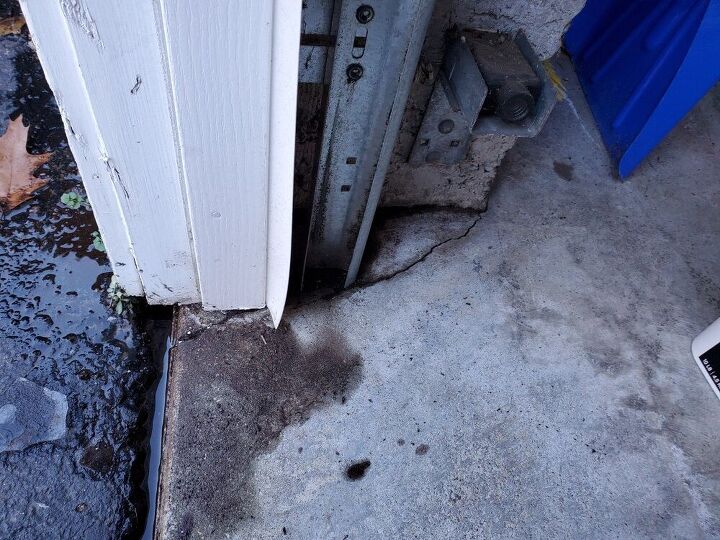 q cracks in garage floor near door worry