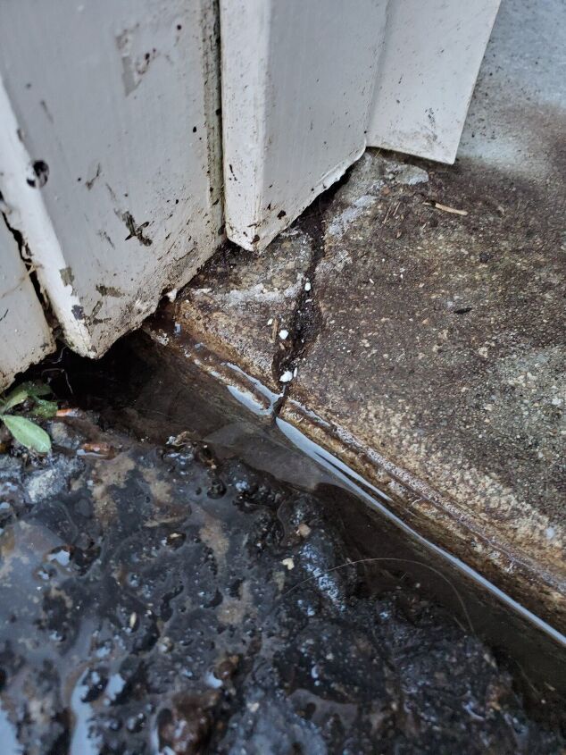 q cracks in garage floor near door worry