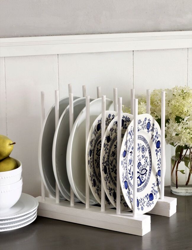 s 15 secrets you need to know to keep your countertop clutter free, DIY this simple plate rack from wood dowels