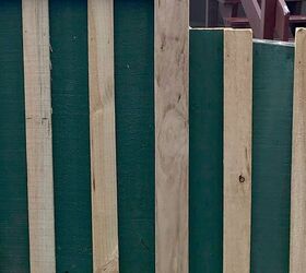 Using boards, they turned their old fence into a beautiful, privacy booster