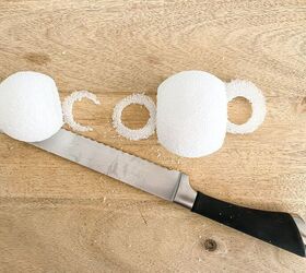 Cut holes in 2 styrofoam balls to add a whole lot of cuteness to your countertop