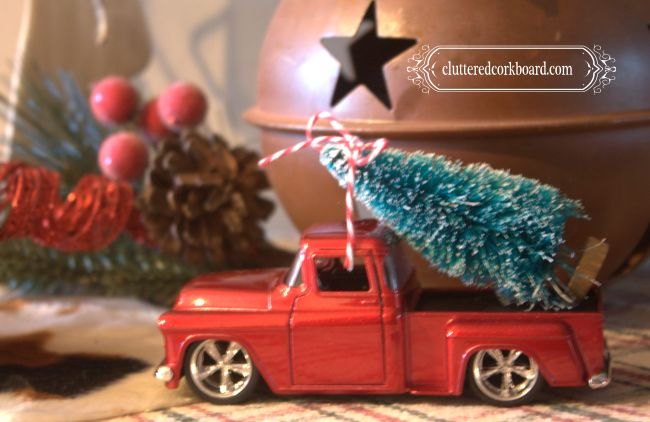 s 10 adorable ways people are decorating with bottle brush trees, DIY a mini Christmas tree hauling truck with a toy car and a bottle brush