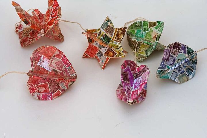 13 reasons to save your cardboard boxes this season, Upcycle cardboard packaging and used stamps into colorful ornaments