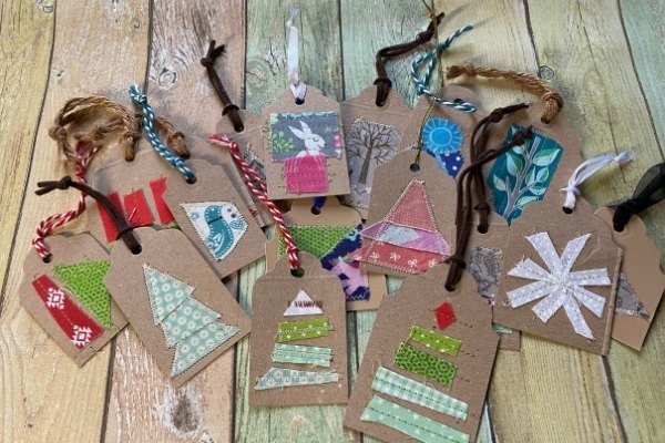 13 reasons to save your cardboard boxes this season, Make playful Christmas gift tags from cardboard and fabric scraps