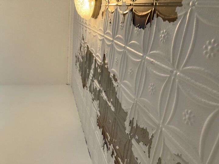 q stripping paint from a tin ceiling