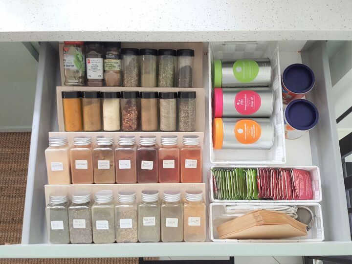 21 ideas thatll help organize your life in 2021, Get a handle on your spices with this convenient in drawer rack