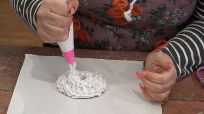 Squeeze fake whipped cream onto paper for this insanely cute Christmas gift idea!