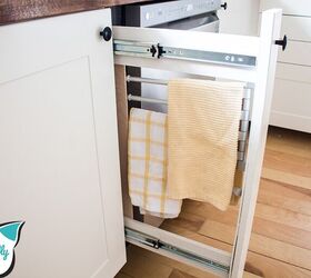 15 ideas that belong on your diy resolution list, Turn an empty awkward space in your kitchen into a roll out towel rack