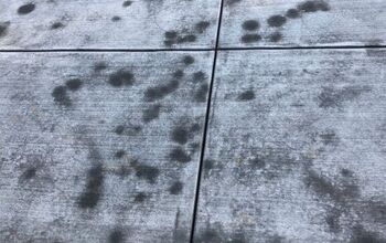 Newly poured concrete has dark spots and streaks throughout..HELP ...