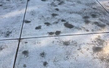 Newly poured concrete has dark spots and streaks throughout..HELP ...