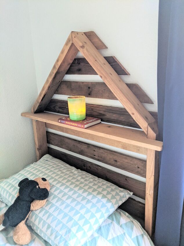 s the 15 best bedroom updates of 2020, Build a rustic house shaped headboard from pallet wood