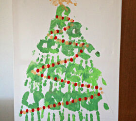 s 16 alternative christmas trees we re obsessed with this week, Get personal with a Christmas tree canvas made from handprints