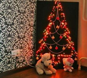 s 16 alternative christmas trees we re obsessed with this week, DIY an anti cat light up Christmas tree from a furniture board