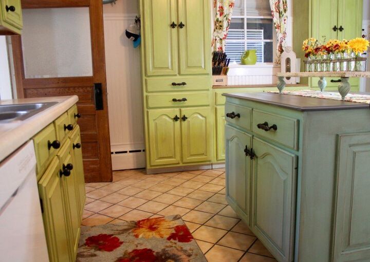 s 15 unique ways to make your kitchen cabinets more beautiful, Transform white kitchen cabinets from drab to fab with fun colors