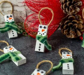 s 15 of our favorite christmas ornaments people made this year, Craft adorable smiley snowmen ornaments from wood blocks