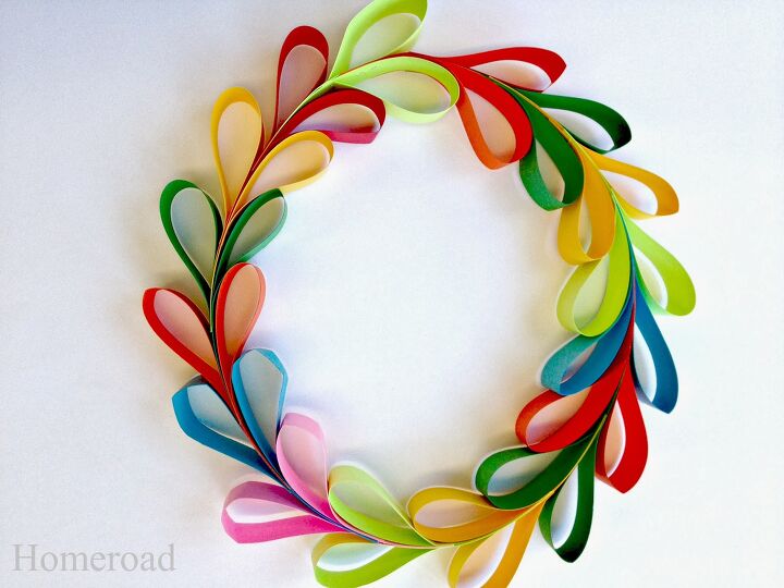15 gorgeous ways to decorate your door after new year s, Add a pop of color to your door with a paper strip heart wreath
