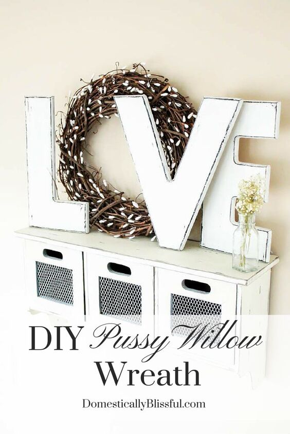 15 gorgeous ways to decorate your door after new year s, Craft a faux pussy willow wreath from Q tips