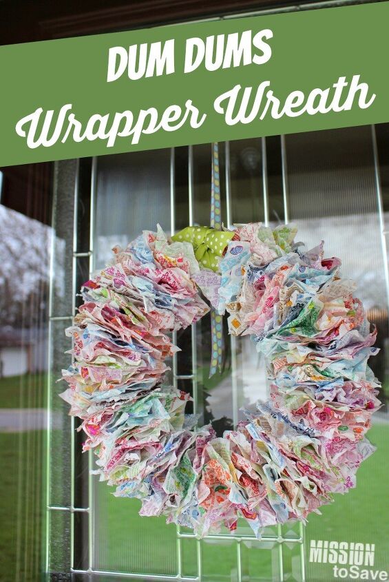 15 gorgeous ways to decorate your door after new year s, Upcycle Dum Dum wrappers into a one of a kind door wreath