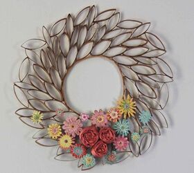 15 gorgeous ways to decorate your door after new year s, Upcycle toilet paper rolls into a pretty floral wreath
