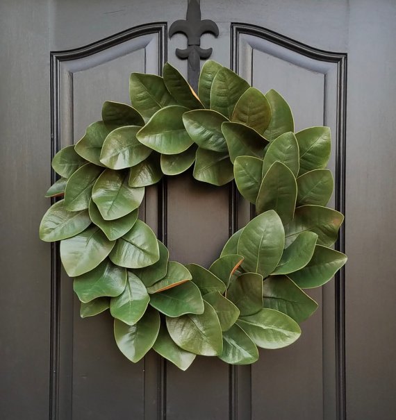 15 magnficas formas de decorar tu puerta despus de ao nuevo, Guirnalda de magnolias para decorar todos los d as