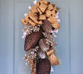 15 gorgeous ways to decorate your door after new year s, Give your door some stunning snowy swag