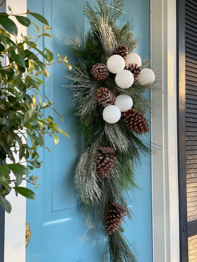 15 gorgeous ways to decorate your door after new year s, Make a stunning winter arrangement for your door