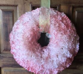 15 gorgeous ways to decorate your door after new year s, Repurpose coffee filters into a fluffy faux carnation wreath