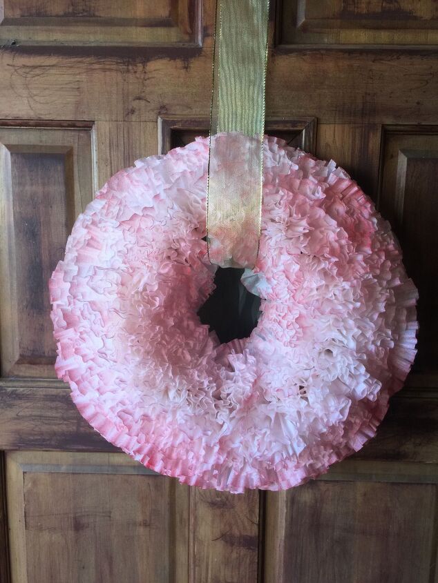 15 gorgeous ways to decorate your door after new year s, Repurpose coffee filters into a fluffy faux carnation wreath