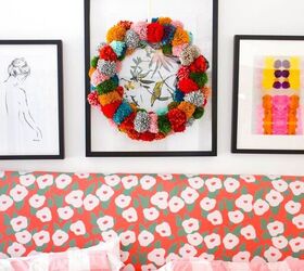 15 gorgeous ways to decorate your door after new year s, Brighten your door with a fun and colorful pompom wreath