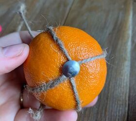 Stick a thumbtack into an orange for this year-round deocration