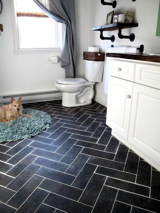 10 easy bathroom makeovers you can do in 1 day, Peel n stick a gorgeous herringbone floor with luxury vinyl tiles