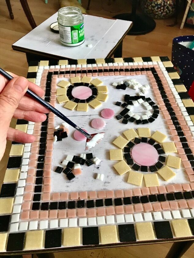 how to transform old coffee tables with mosaic, Using pva glue to stick glass tiles
