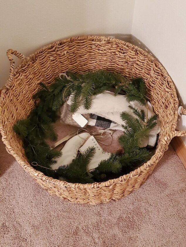 repurpose your christmas tree collar as storage throughout the year