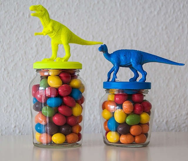 s boost your mood with these 12 colorful decor ideas, Upcycle empty jars into dinosaur themed candy jars