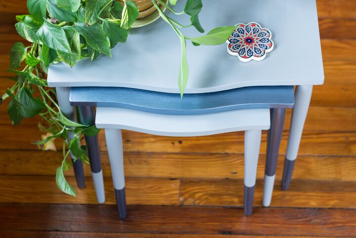 13 eye catching end tables you ll definitely want to add to your home, Spruce up plain nesting tables with shades of blue