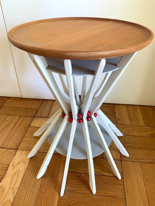 s 13 eye catching end tables you ll definitely want to add to your home, Repurpose wooden clothes hangers into a stunning side table