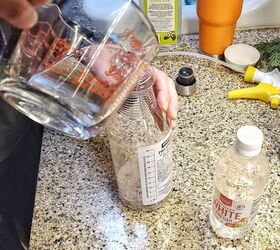 Spray vinegar into a glass vase for this gorgeous upgrade