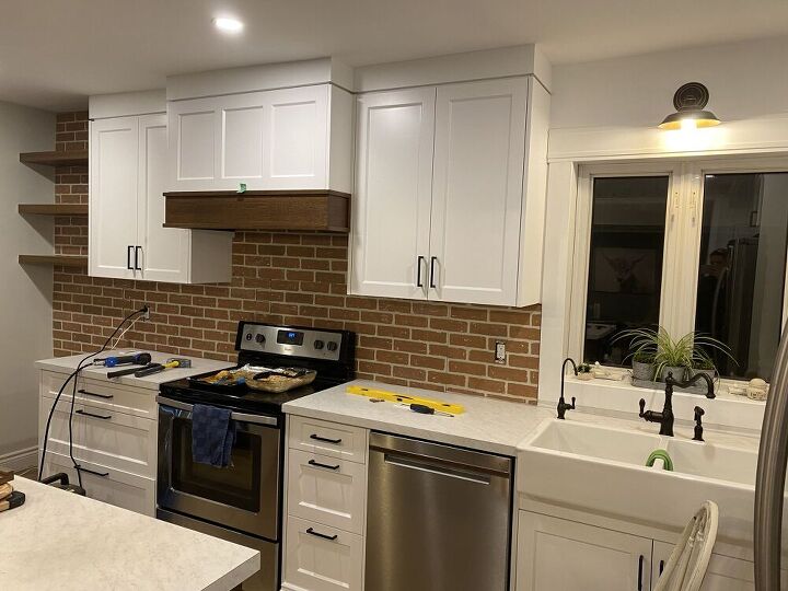 german schmear brick backsplash, Hanging the brick