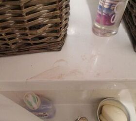 Clean permanent hair dye from a plastic loo seat and window sill