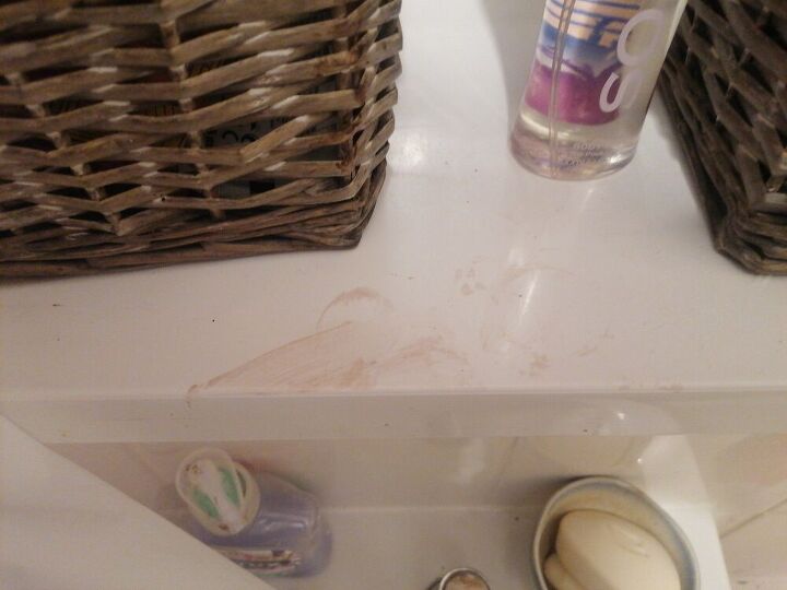 q clean permanent hair dye from a plastic loo seat and window sill