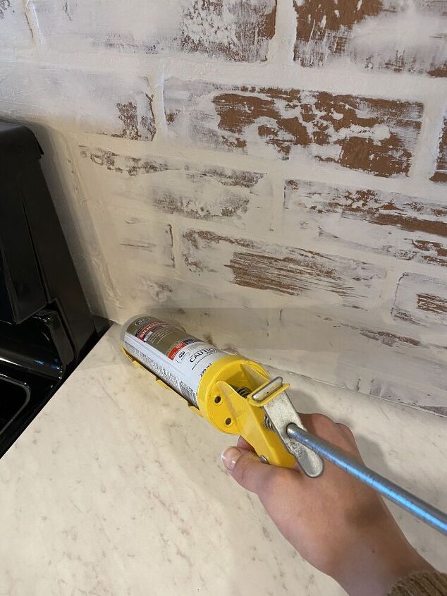 german schmear brick backsplash, Caulking