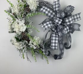 s 12 amazing decor ideas for after christmas decorating, Design a classic flocked winter wreath