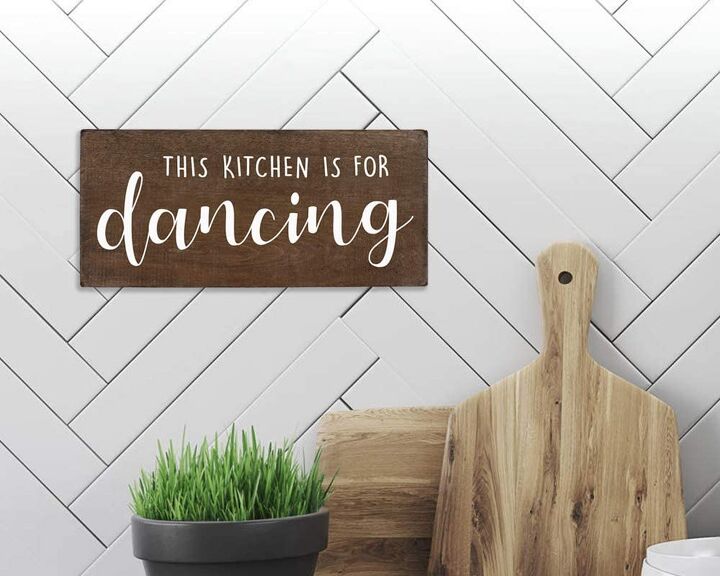 10 letreros para la cocina que harn que su espacio se sienta fabulosamente como una, Cartel Esta cocina es para bailar