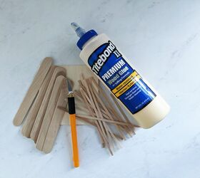 Turn popsicle sticks into designer decor on a slim $1 budget