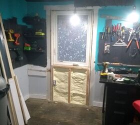 exterior door replacing a window with a door in the workshop