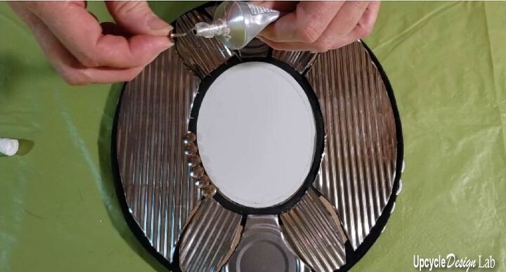 espejo con marco metlico diy latas de conserva recicladas