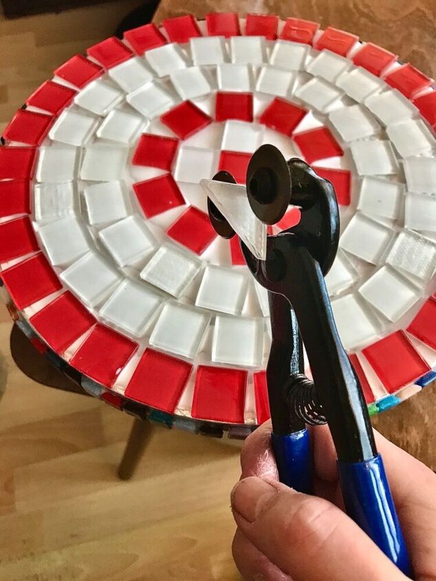 how to transform a cake stand into a mosaic trivet, Cutting tile to fit design